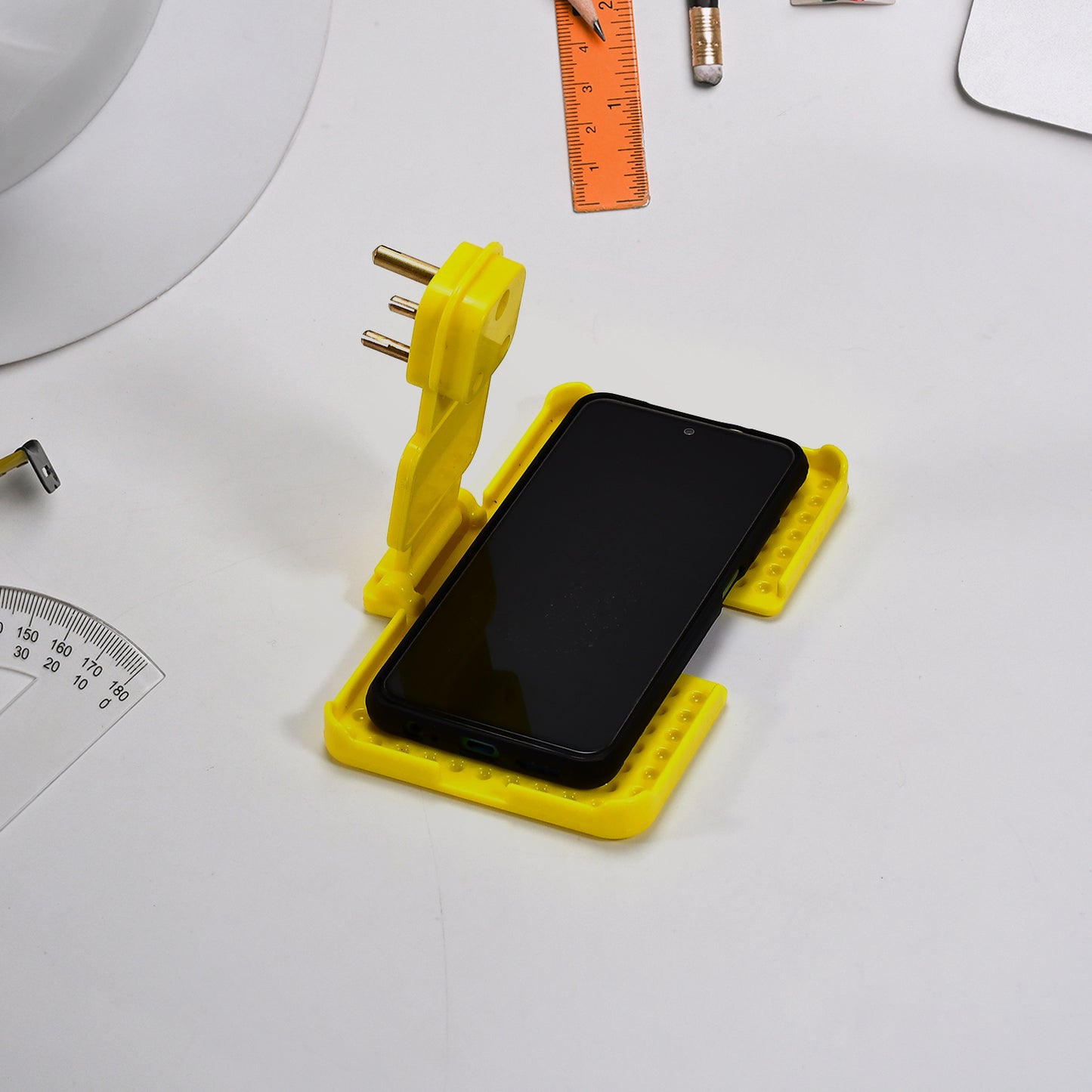 Multi-Purpose Wall Holder Stand For Charging Mobile Just Fit In Socket And Hang (Yellow)